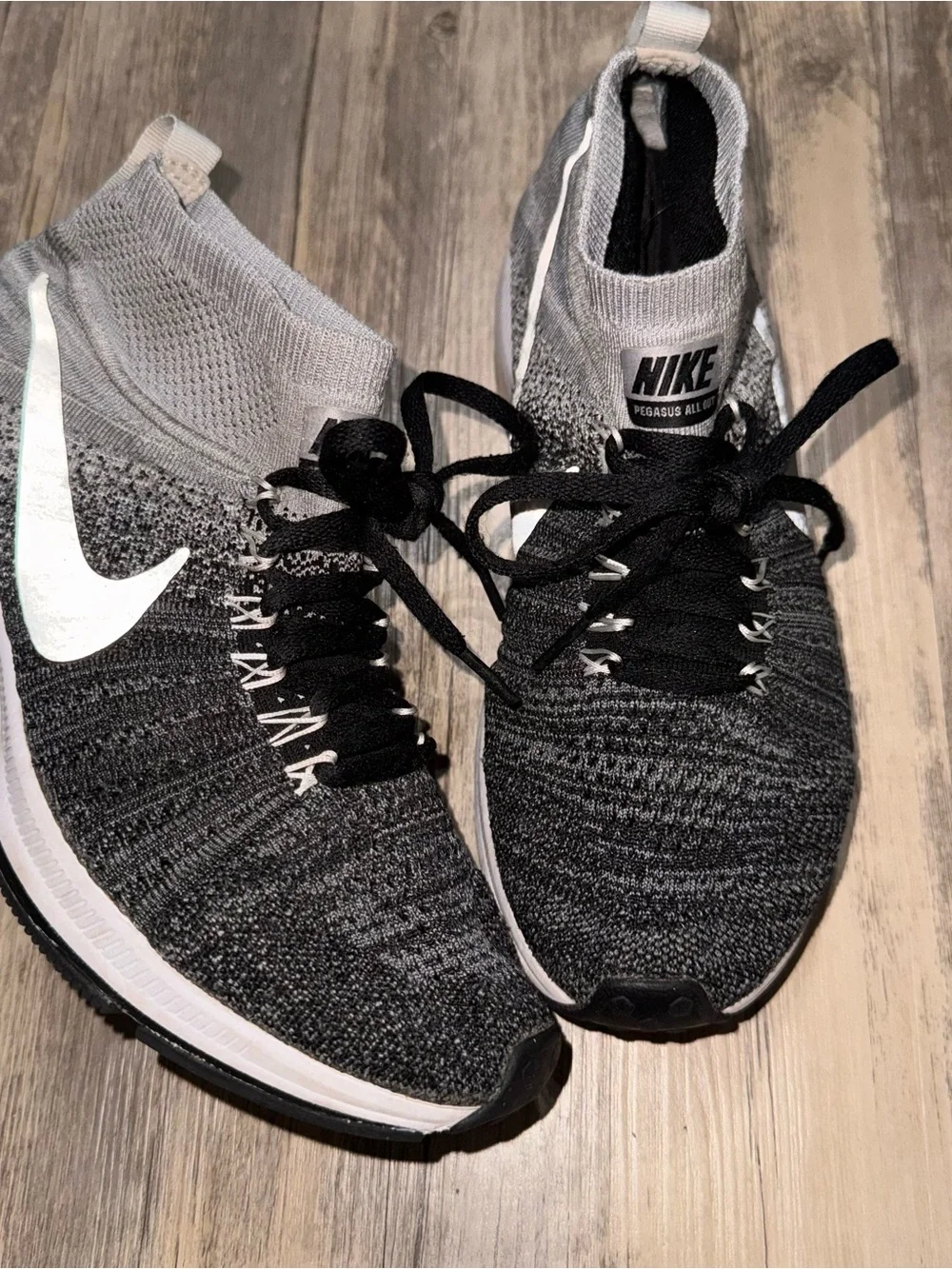 Nike Kids Black and Gray Flyknit High-Top Sneakers with White Swoosh